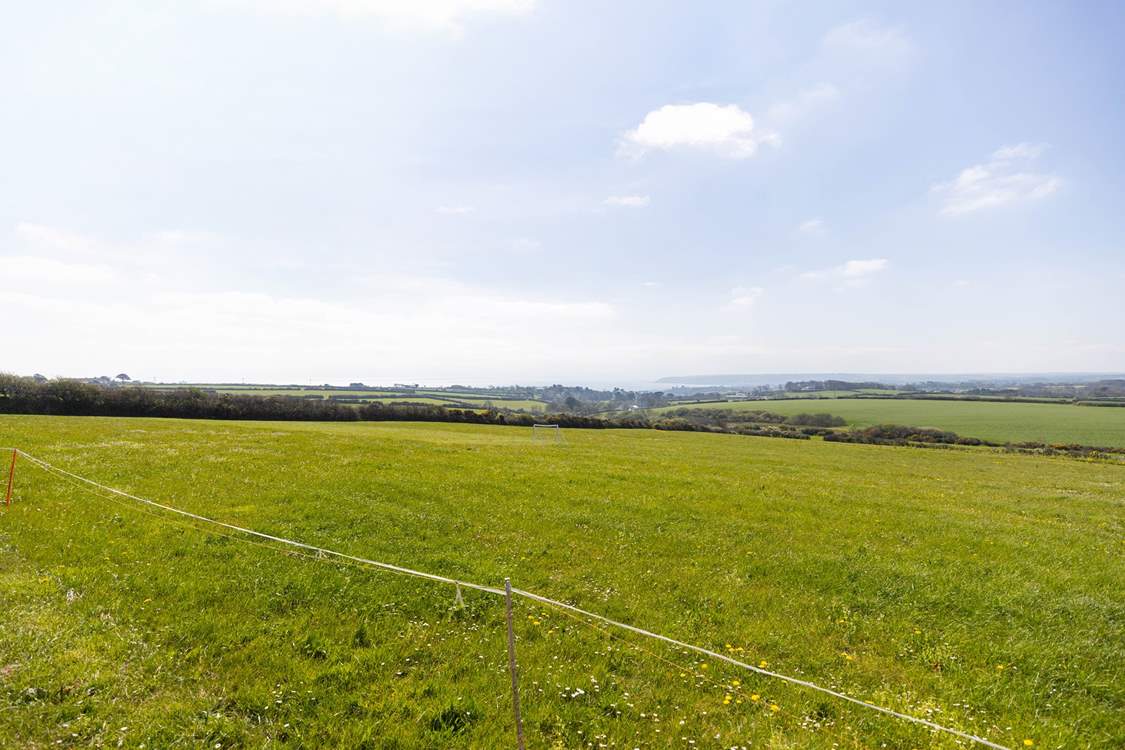 A field with a wonderful far-reaching view, perfect for a leisurely picnic or walking the dogs.