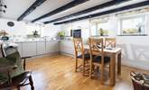 Original beams line the ceilings in this home, so full of charm. - Thumbnail Image