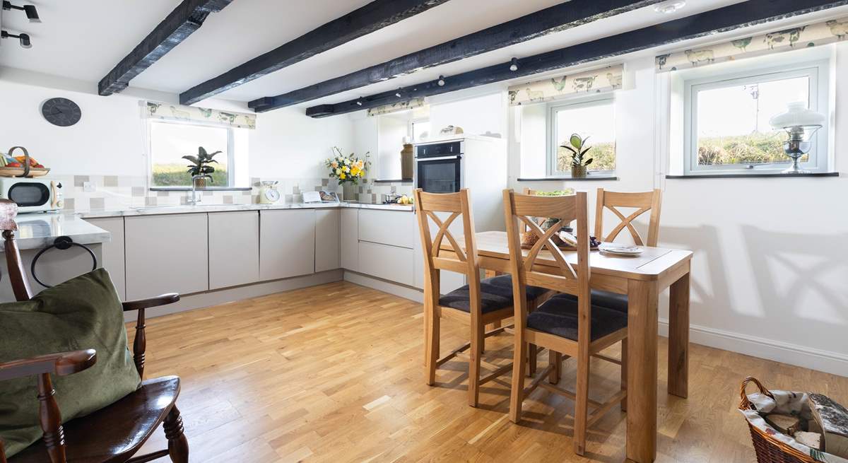 Original beams line the ceilings in this home, so full of charm.