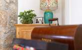 Thick stone walls and a modern interior add to the charm of this cottage. - Thumbnail Image