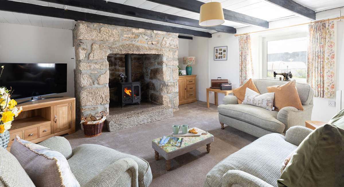 Put your feet up and relax around the cosy wood-burner.
