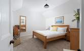 The king-size bedroom located on the ground floor, spacious and light. - Thumbnail Image