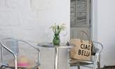 A small quiet shared courtyard is the perfect place to share a glass of wine. - Thumbnail Image