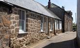 The front of the cottage leads onto a quiet lane although cars do pass through. You can off load your luggage at the top of this lane and park in a nearby car park. - Thumbnail Image