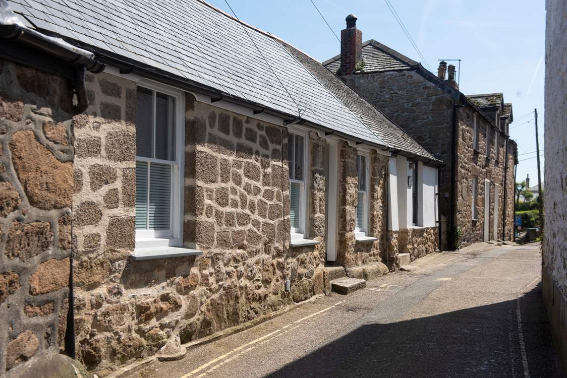 The front of the cottage leads onto a quiet lane although cars do pass through. You can off load your luggage at the top of this lane and park in a nearby car park.