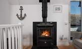 When the south west wind blows, snuggle up by the huge wood-burner. - Thumbnail Image