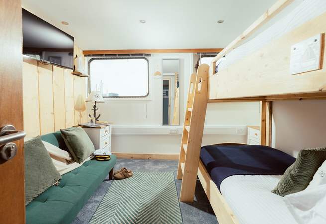 The bunk-room is the ideal hideout for adults and children alike.