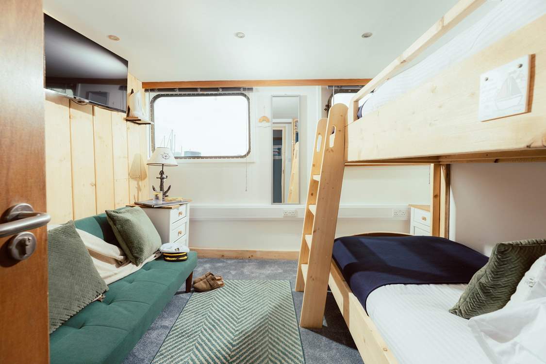 The bunk-room is the ideal hideout for adults and children alike.