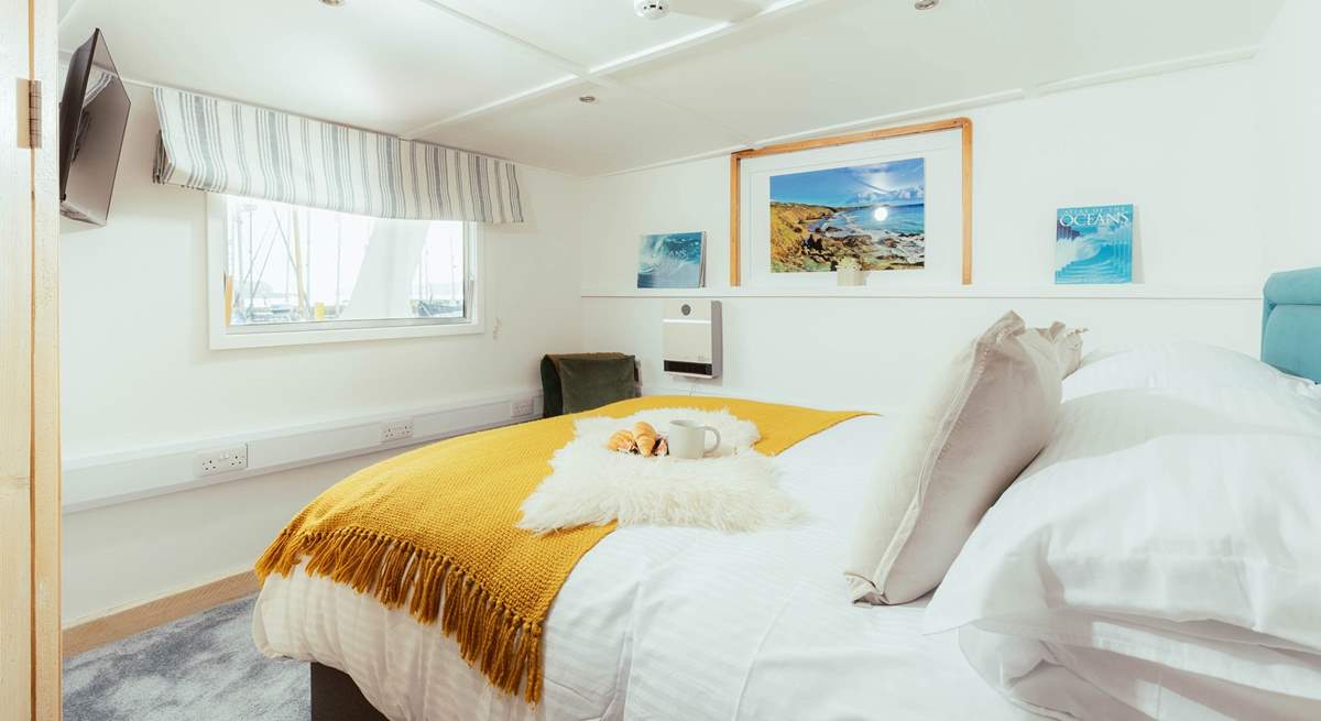 The Captain's room is the perfect space for a restful night's sleep.