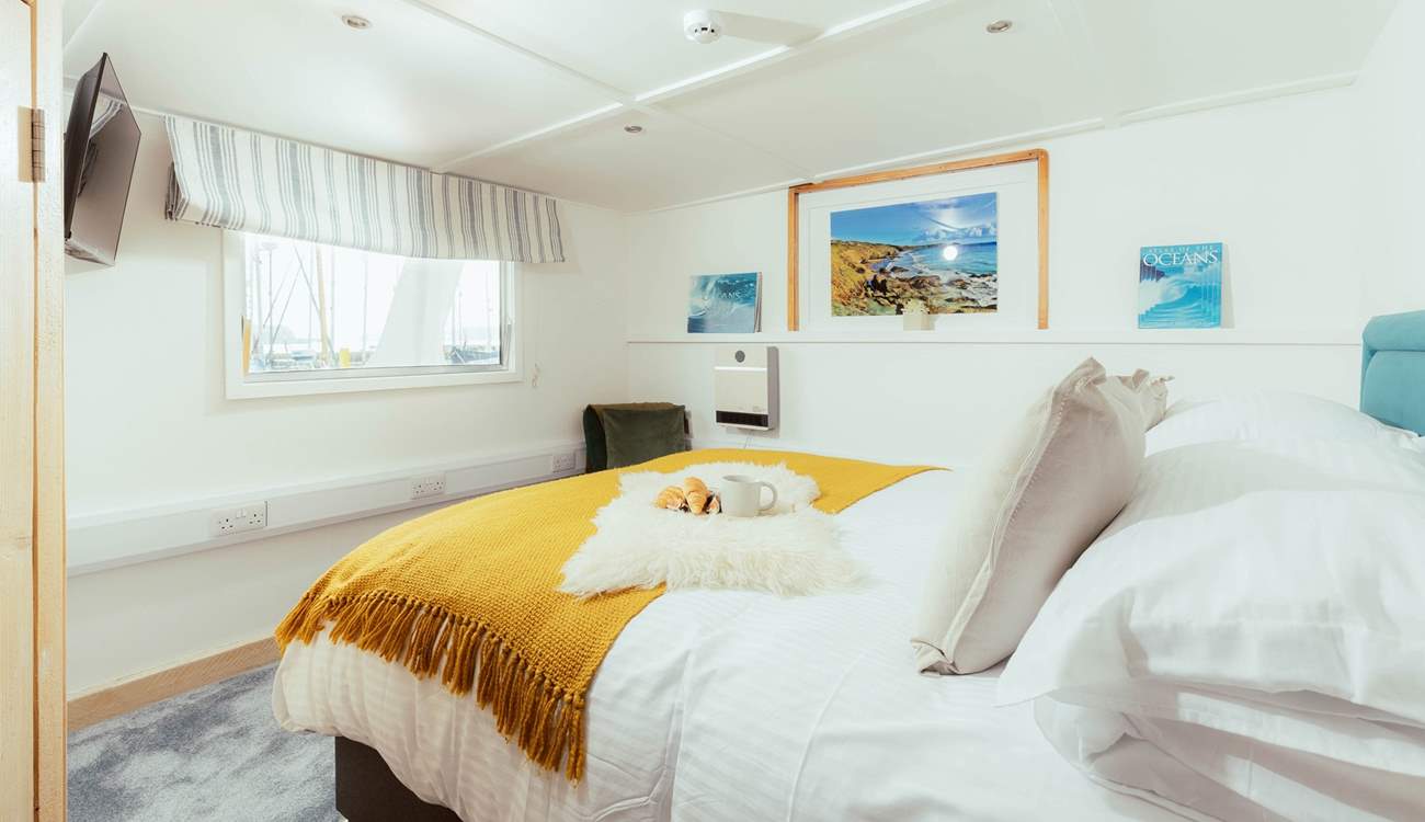The Captain's room is the perfect space for a restful night's sleep.