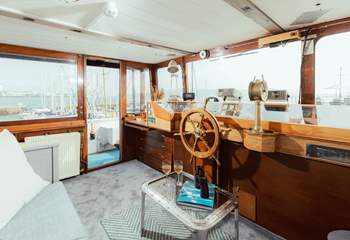 Carefully make your way up to the top deck where you can enjoy views across the ever-changing harbour.