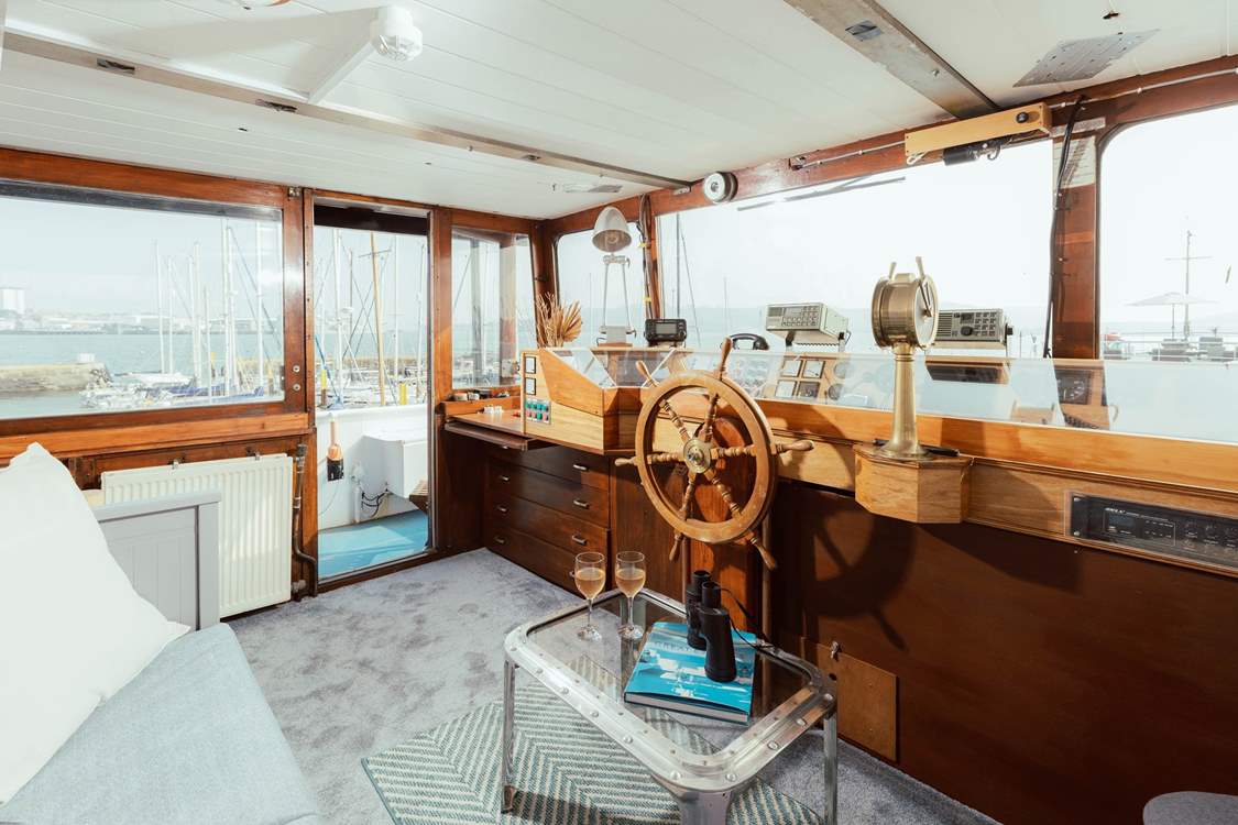 Carefully make your way up to the top deck where you can enjoy views across the ever-changing harbour.