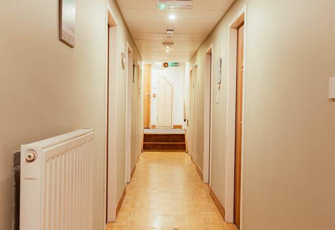 The long corridor which leads to the crews' cabins.