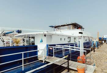 Step aboard your unique houseboat getaway.