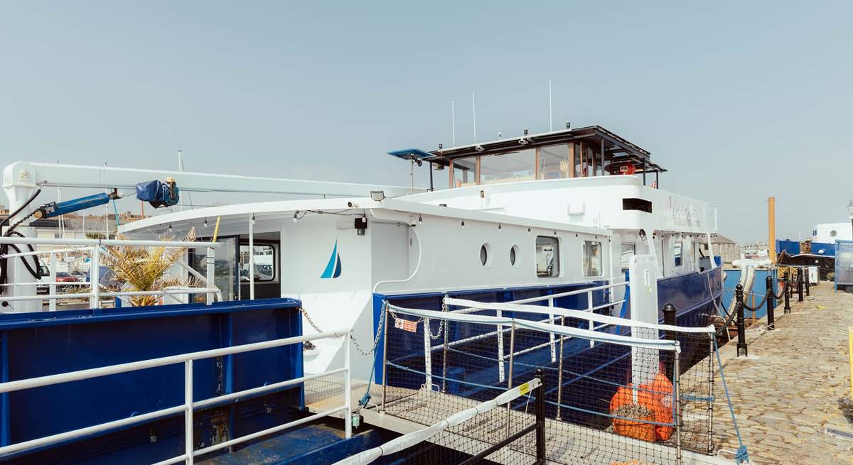 Step aboard your unique houseboat getaway.