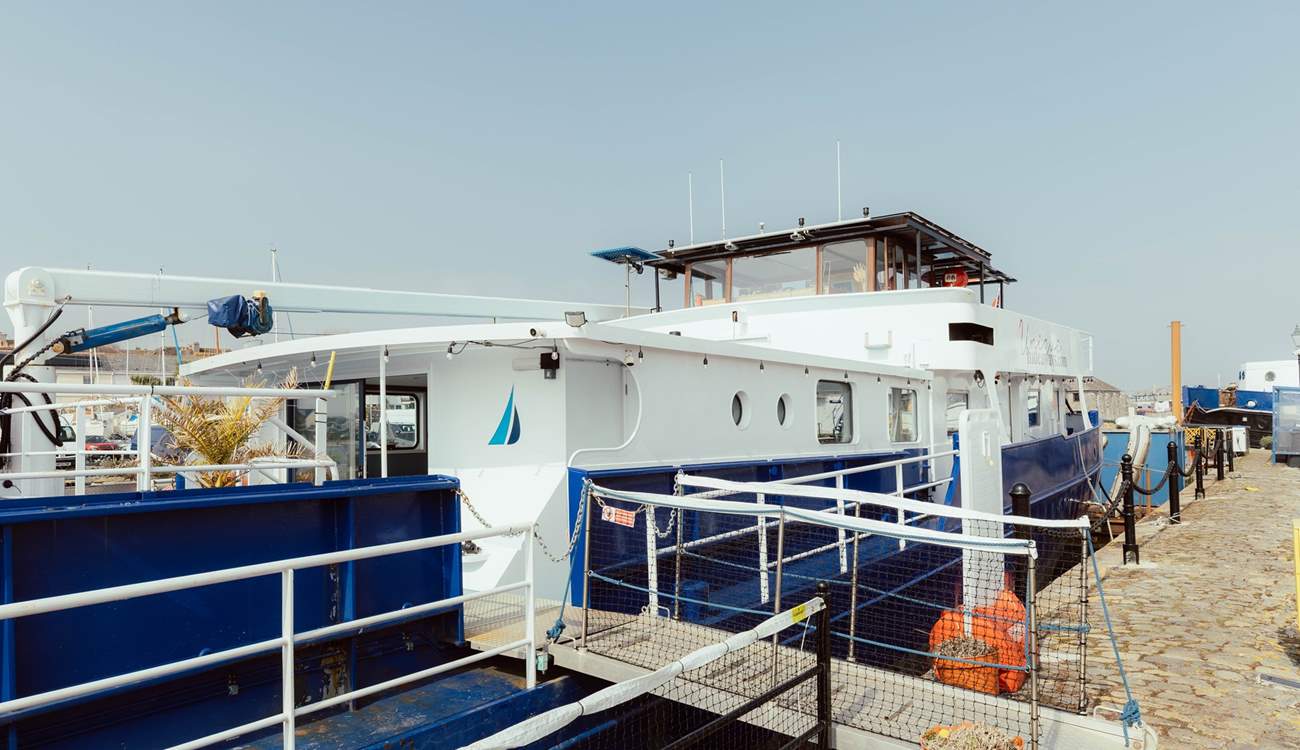 Step aboard your unique houseboat getaway.