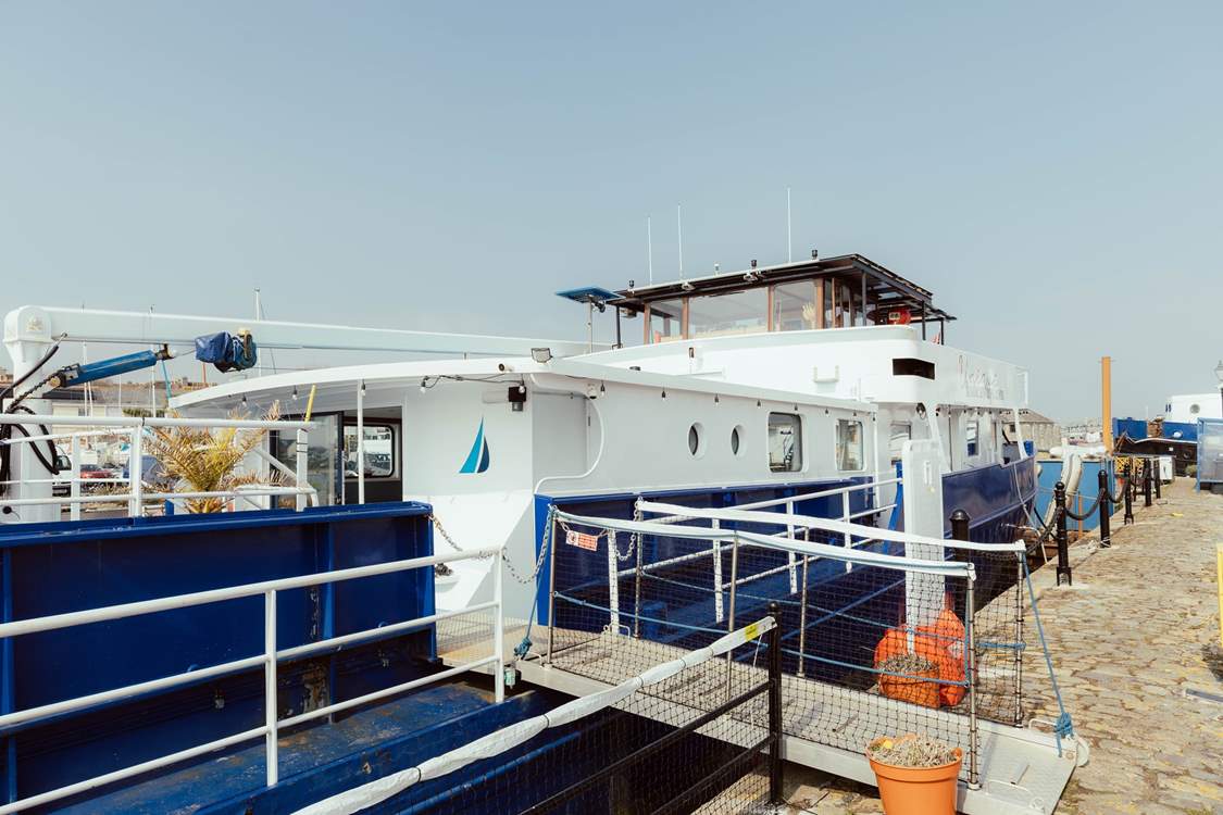 Step aboard your unique houseboat getaway.