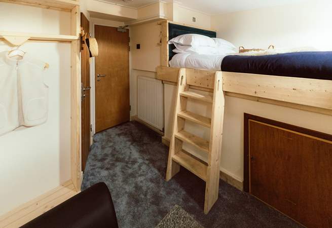 The first mate's cabin resides upstairs.
