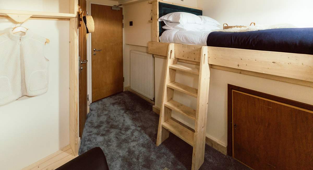 The first mate's cabin resides upstairs.