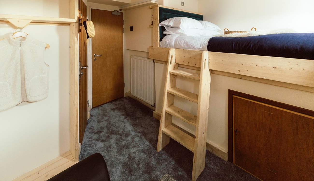 The first mate's cabin resides upstairs.