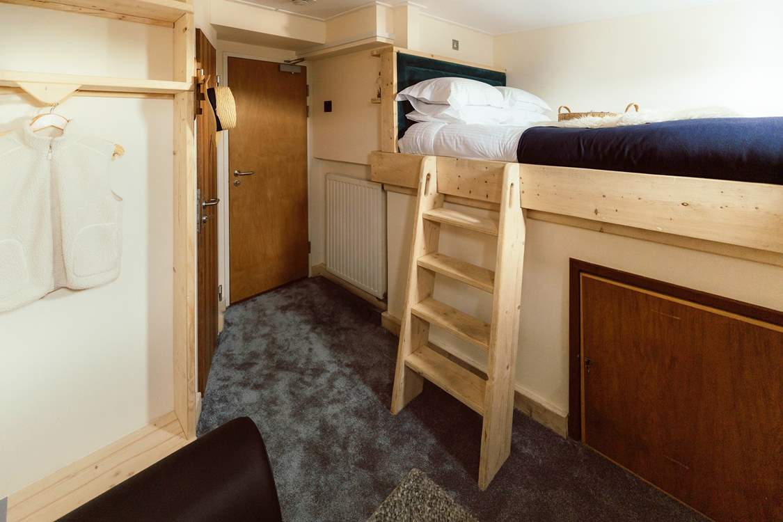 The first mate's cabin resides upstairs.