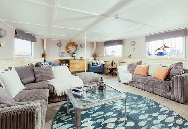 Wander through into the open plan living space where the natural light streams effortlessly in.