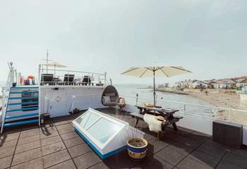 The two-tiered decking offers you a place to relax and unwind with the carpet of sea around you.