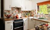 The modern kitchen is ready for you to create great meals. - Thumbnail Image