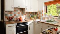 The modern kitchen is ready for you to create great meals.