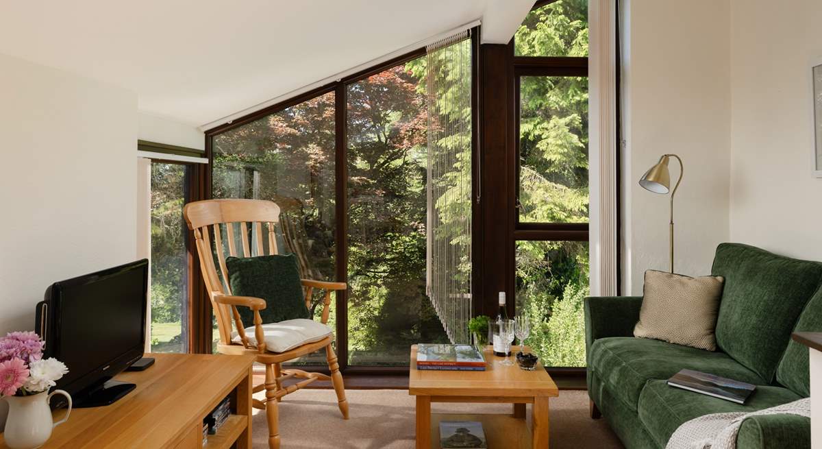 Nestled in the canopy of trees.