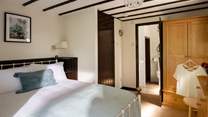 The comfortable double bedroom has its own en suite.