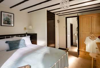 The comfortable double bedroom has its own en suite.