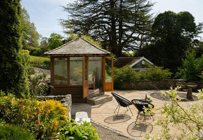 Front patio and summer-house.