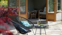 This spacious patio gets the afternoon and evening sun.
