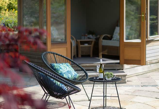 This spacious patio gets the afternoon and evening sun.