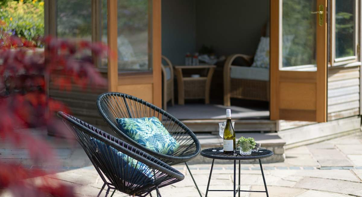 This spacious patio gets the afternoon and evening sun.