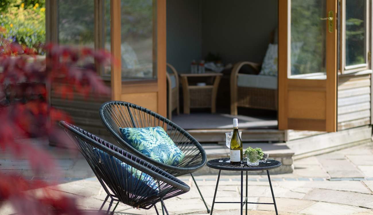 This spacious patio gets the afternoon and evening sun.