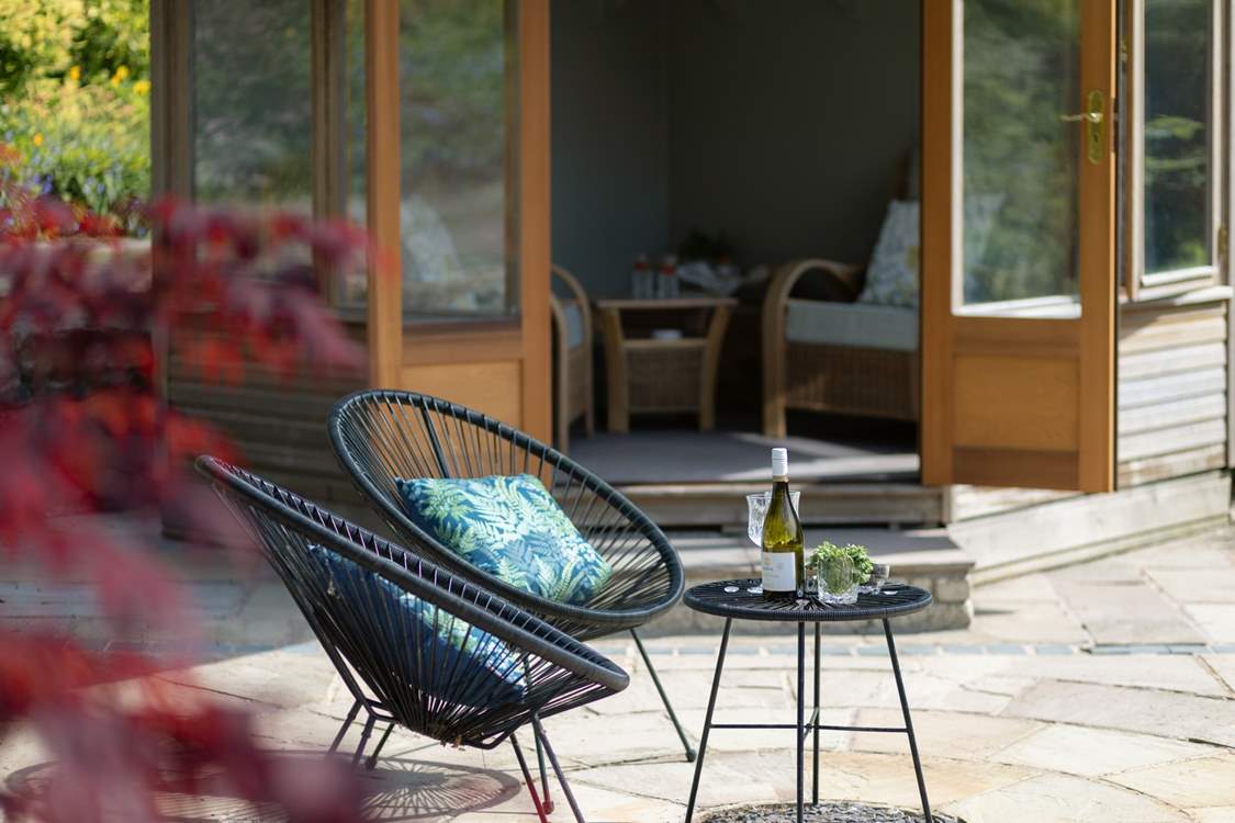 This spacious patio gets the afternoon and evening sun.