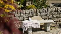 A rustic bench for a quiet moment.