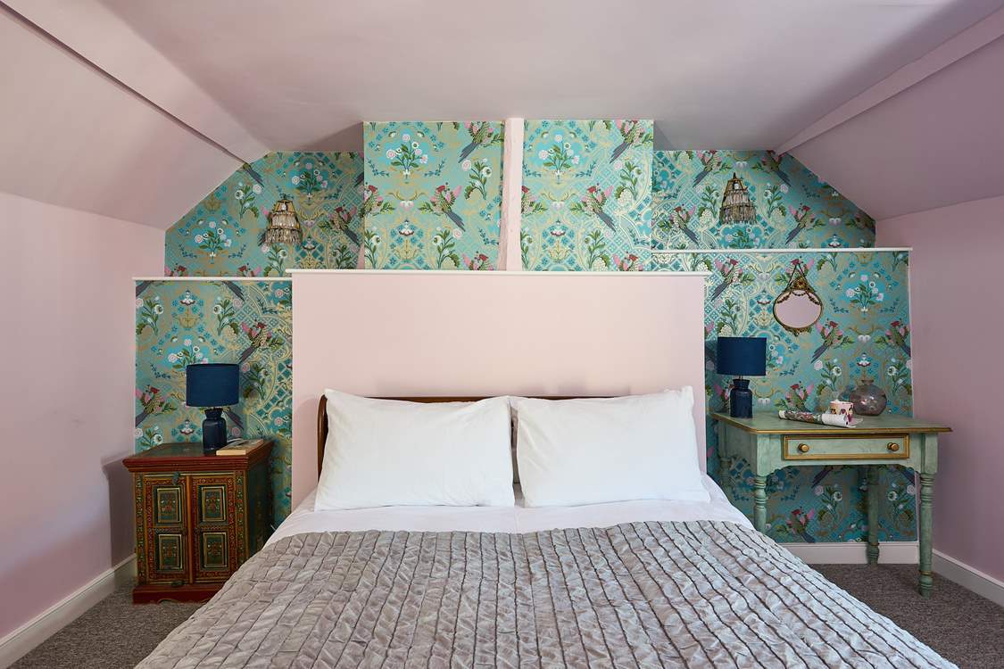 There's another king-size bed in bedroom 2 on the second floor.