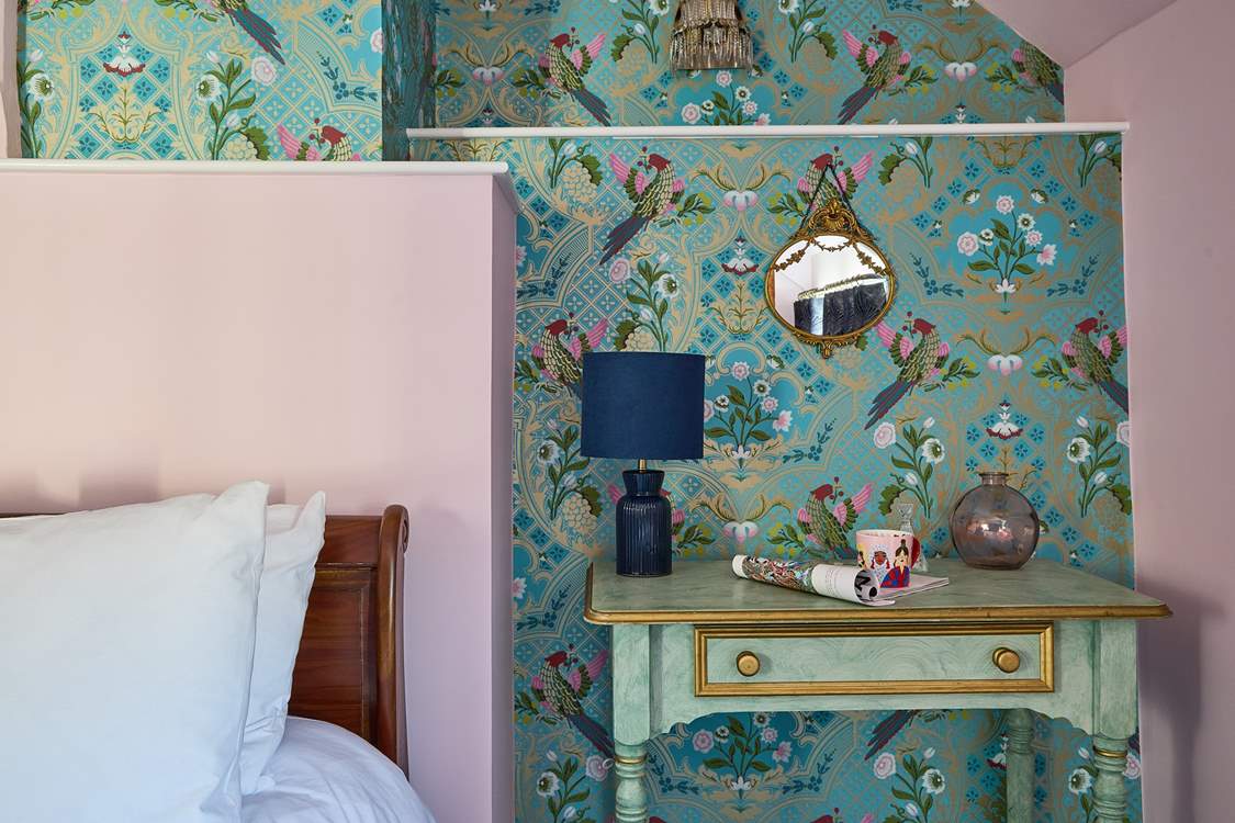 The feature wallpaper, really brings the room to lfe.