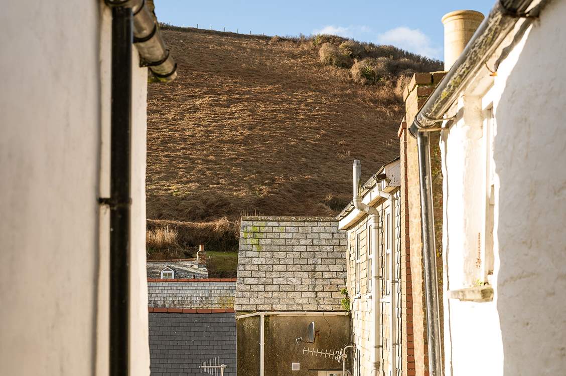 The view from the landing across the rooftops of the neighbouring cottages.