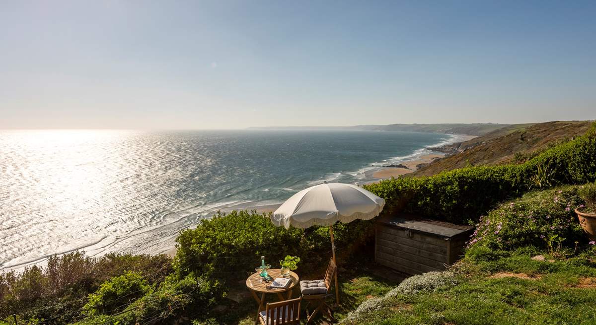 The sun soaked garden is set over different levels, each one getting that little closer to the sea.