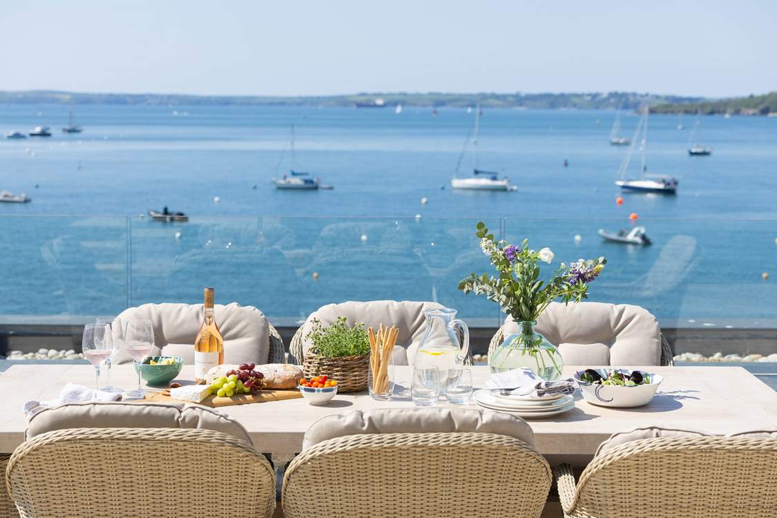 Watch the boats bobbing in the harbour from your prime position.