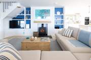 Beautifully designed in seascape tones, the sitting-area is the place to relax after a busy beach day.