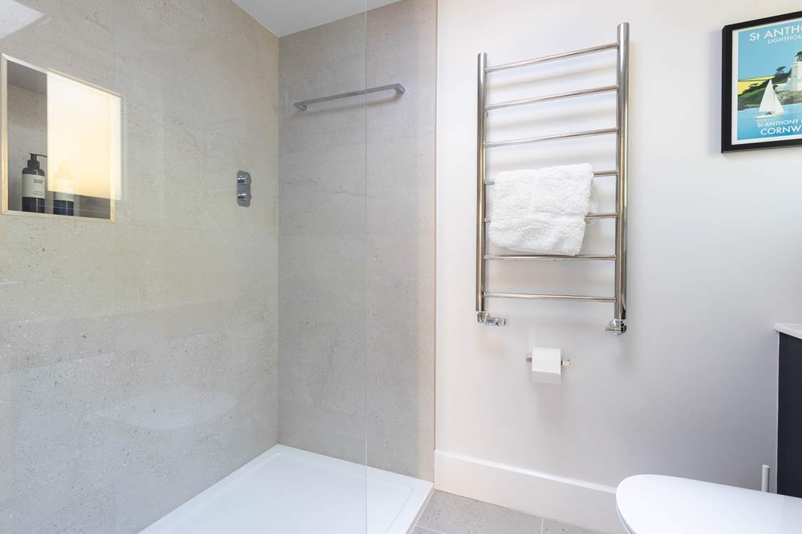 The ground floor is home to a shower-room, perfect for rinsing salty toes after a day at the beach.
