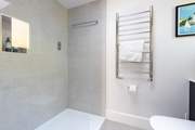 The ground floor is home to a shower-room, perfect for rinsing salty toes after a day at the beach.