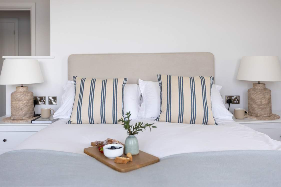 Beautiful linens await in each bedroom.