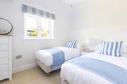 The twin bedded room is ideal for either adults or children.