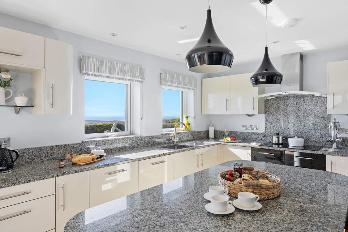 The magnificent kitchen with views of the sea.